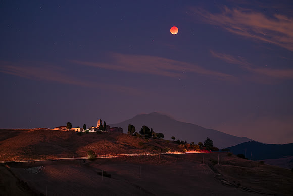 Moon Eclipse Above Mount Etna and Borgo Giuliano