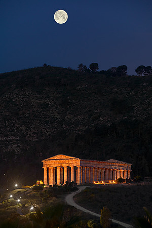 Flower Moon Setting Over The Ancient Temple Of Segesta