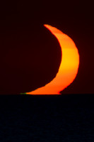 Green Flash and Partial Eclipse Over The Sea Crop 2