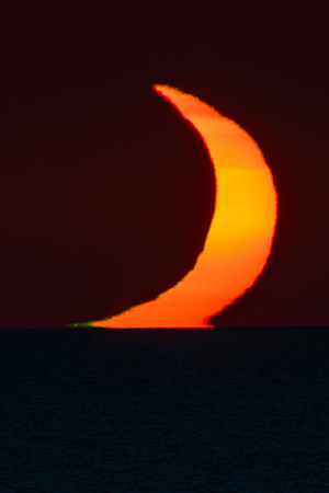 Green Flash and Partial Eclipse Over The Sea Crop 2