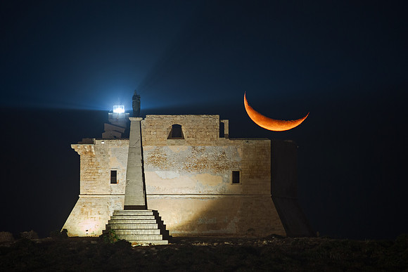 Sickle Moon Above The Fort Of The Island Of Capo Passero