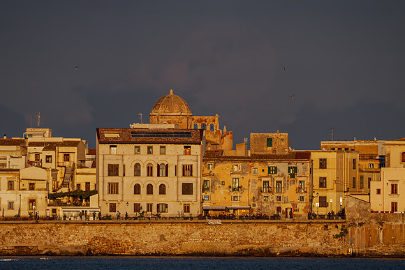 The Moon Plays Hide and Seek on the Island of Ortigia