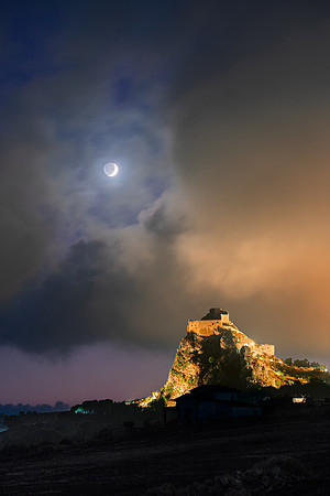 Earthshine Moon Among the Clouds Above Mussomeli Castle