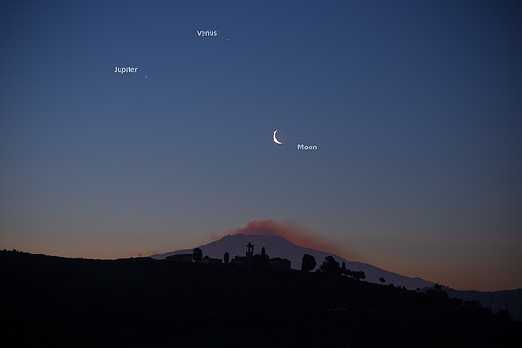 Venus Jupiter and Earthshine Moon Alignment Above Mount Etna and Borgo Giuliano Caption